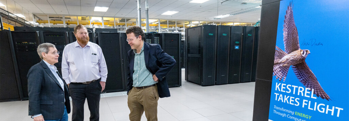 men in a server room