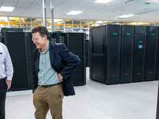 men in a server room