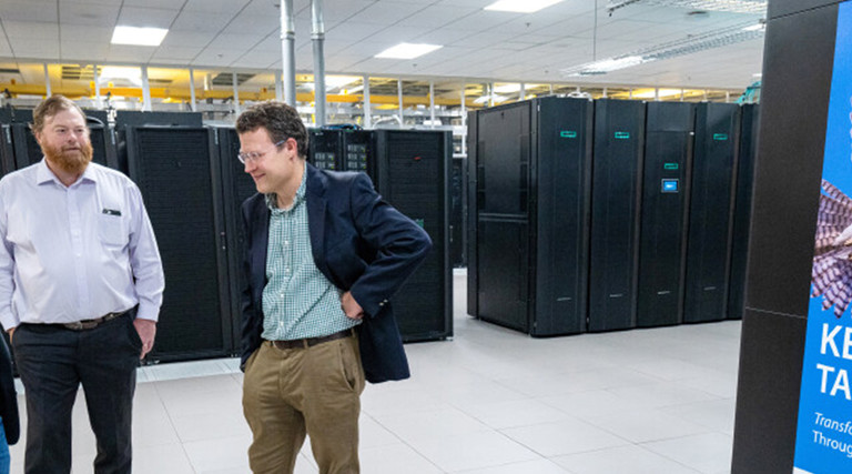 men in a server room