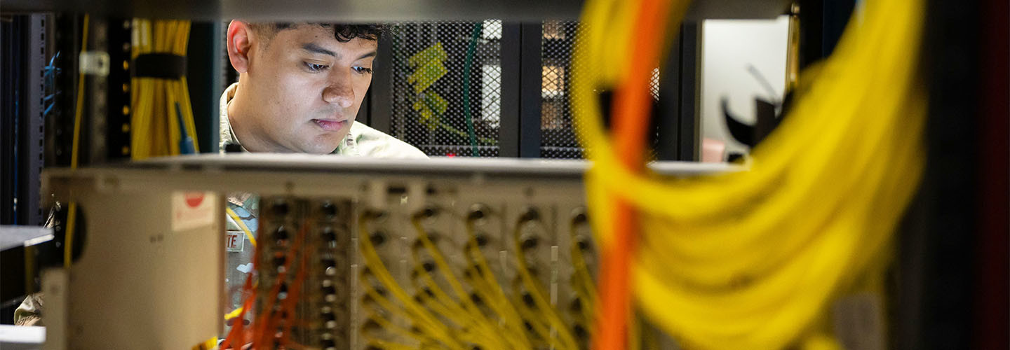 Person working in server room