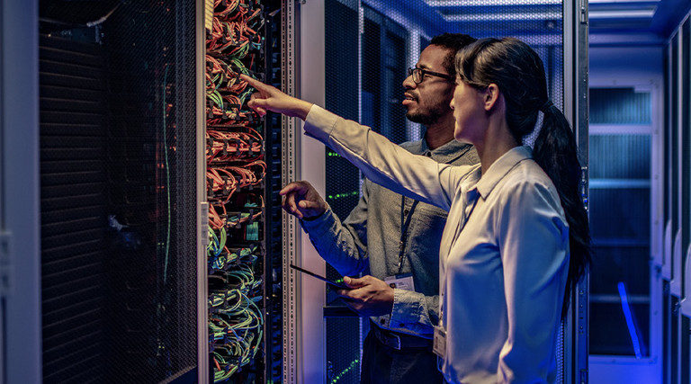 People assessing a data center