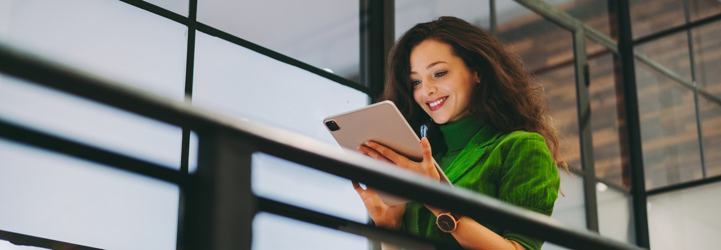 Person using mobile technology in office