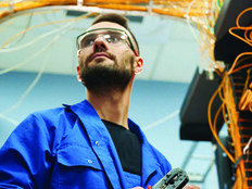 Person working with internet equipment in server room