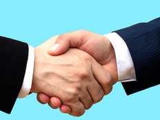 Two people shaking hands