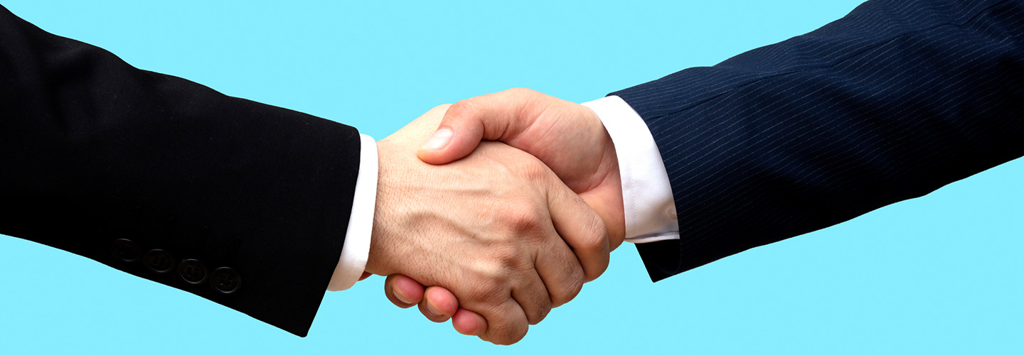 Two people shaking hands