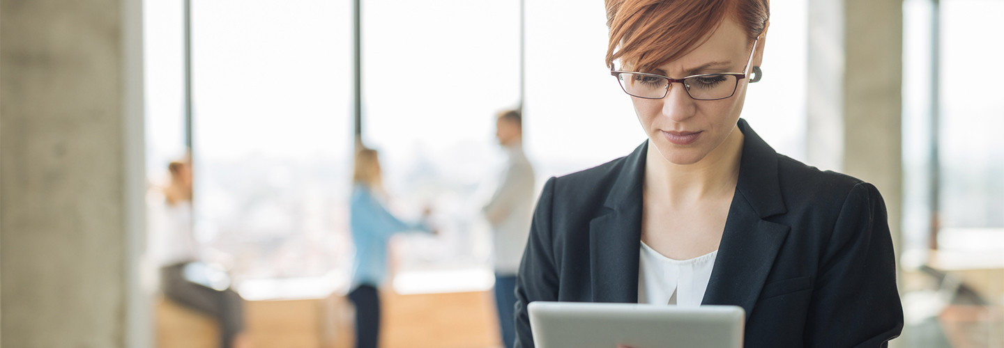 Person working on tablet in the office